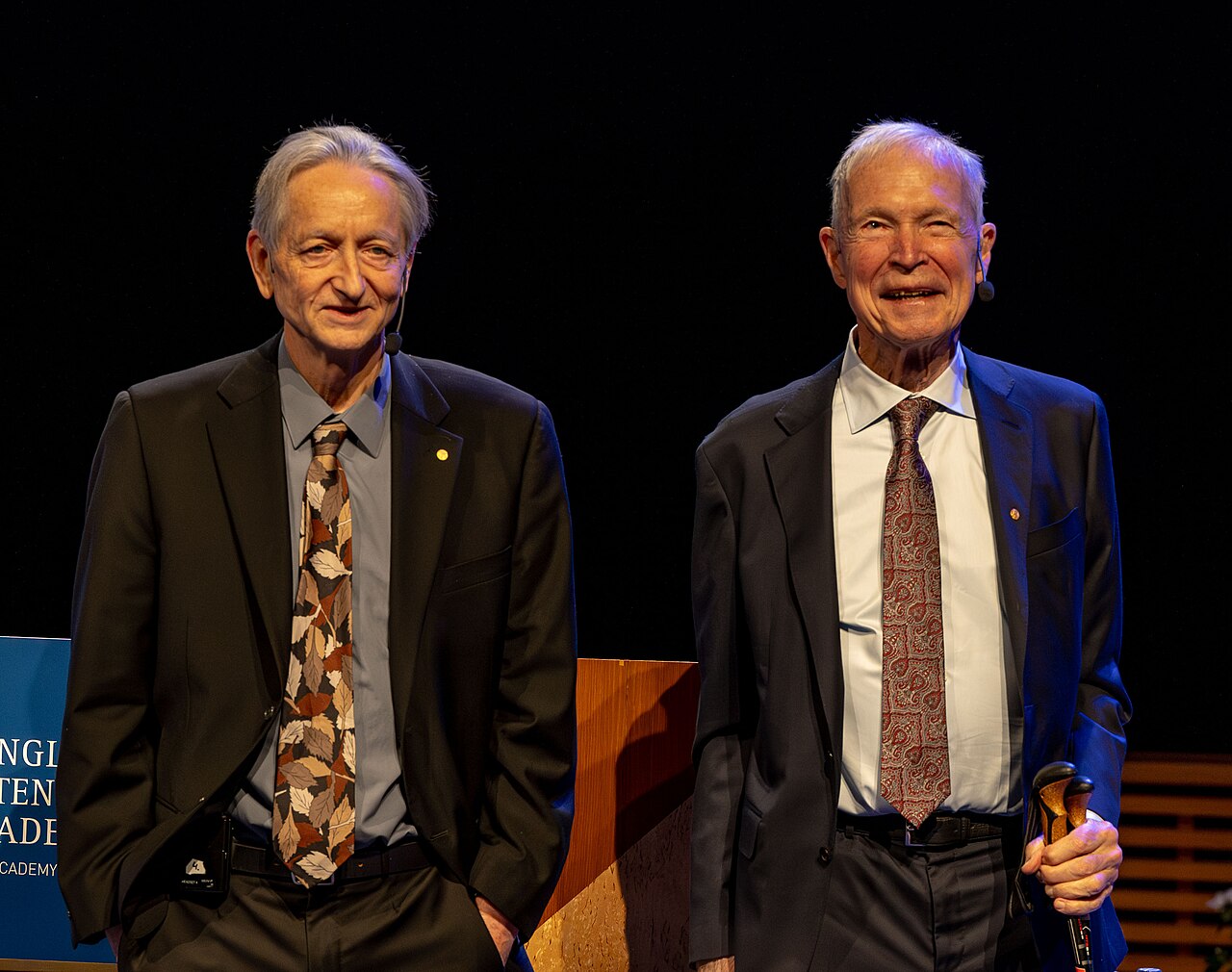 John Hopfield and Geoffrey Hinton seated together at the 2024 Nobel Prize press conference in Stockholm